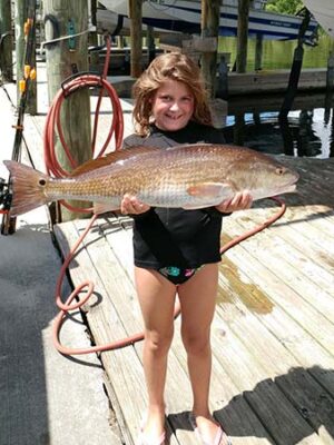 redfish-tropy-young-girl redfish-tropy-young-girl